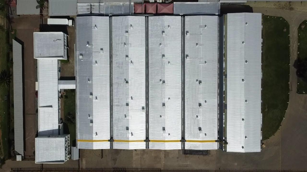 Sicon Group team performing a professional roof restoration at Precision Valve SA