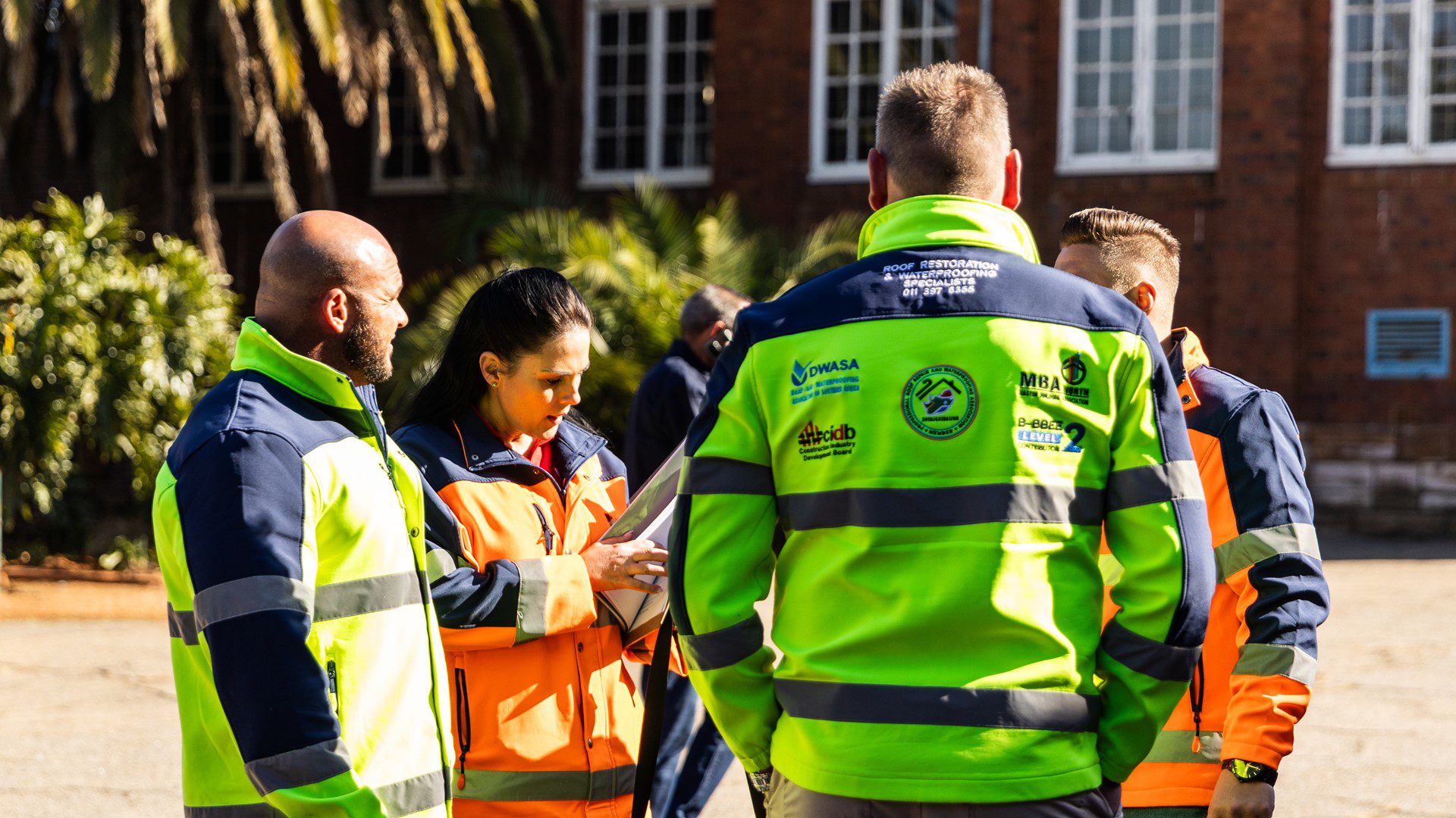 Sicon Group employees discussing tasks during a CSI project