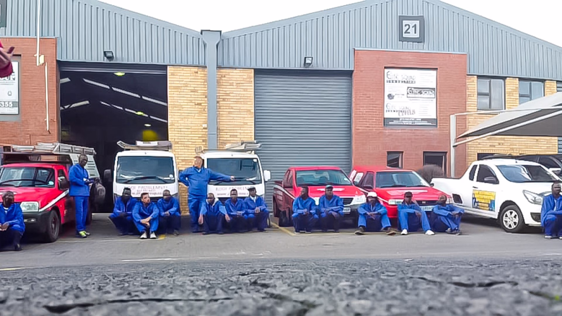 Sicon Group branch showcasing branded service vehicles and building
